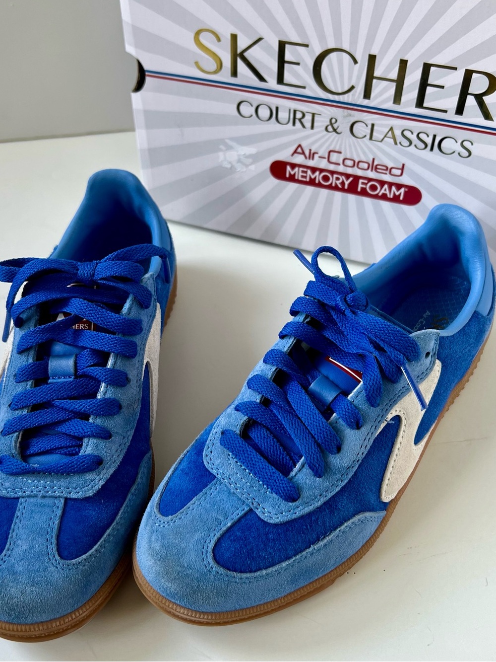 Skechers Women’s Blue Suede & White Accent Sneakers